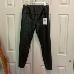 SEXY faux leather leggings. Size L. Never worn with tags!